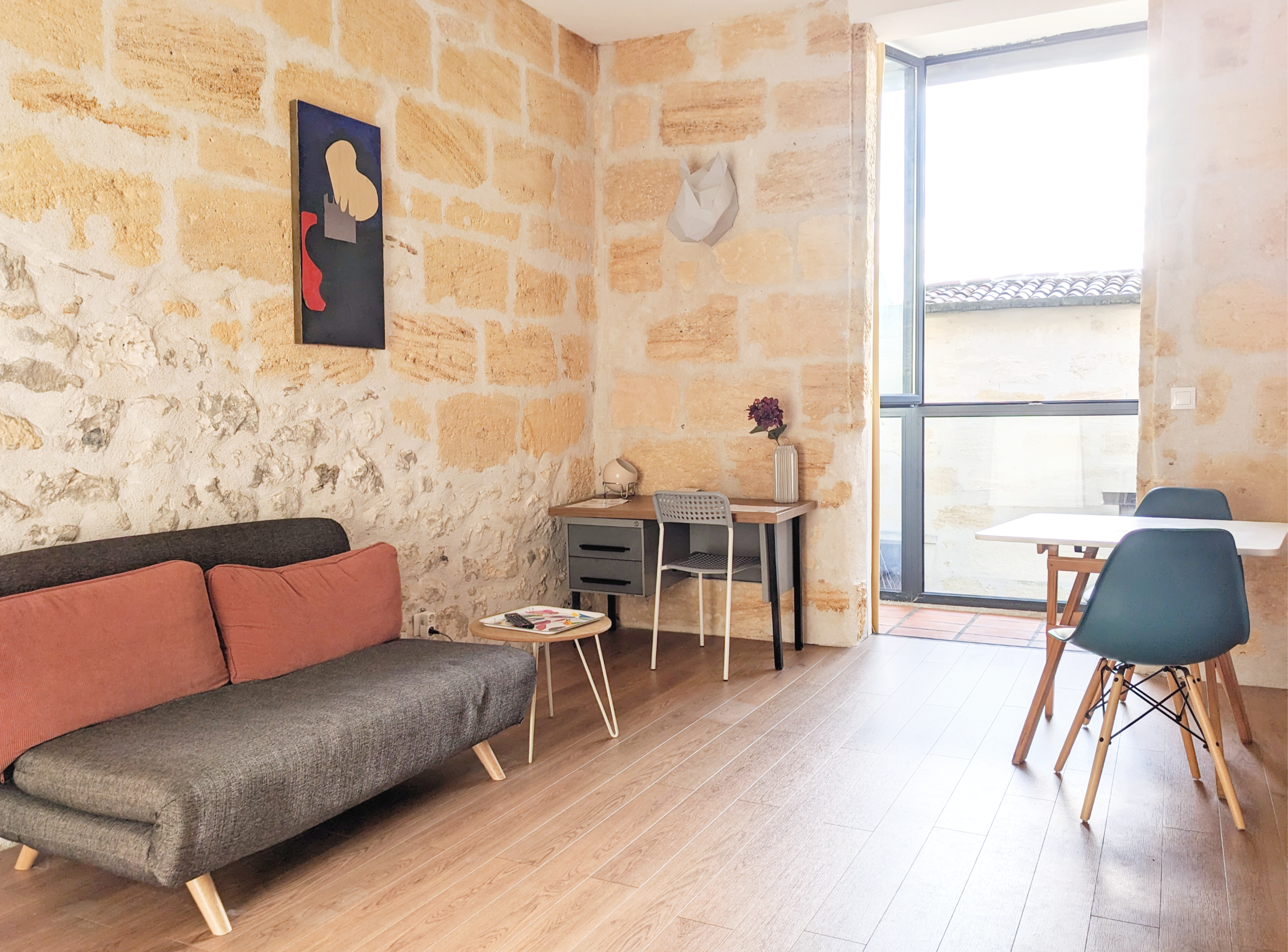 Seating area with sofa and furniture, Studio Jaune B&B Bordeaux Saint Michel